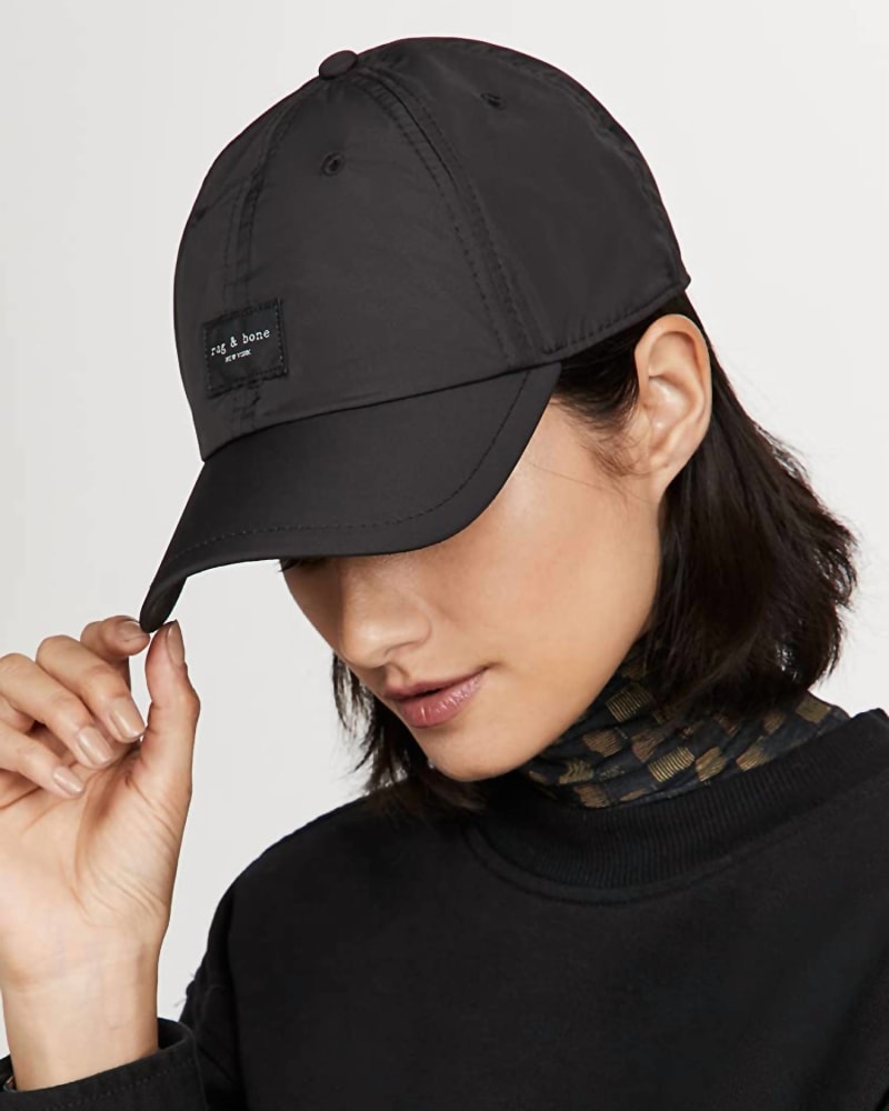 Front of a model wearing a size one-size-fits-all Addison Adjustable Strap Patch Logo Baseball Cap In Black in Black by Rag & Bone. | dia_product_style_image_id:360774
